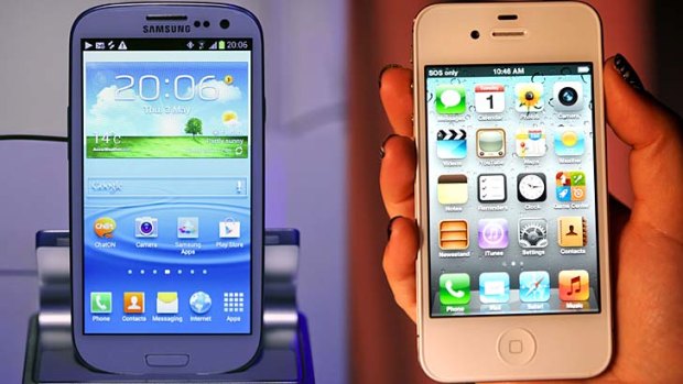 Samsung's Galaxy S III, left, and Apple's iPhone4S.