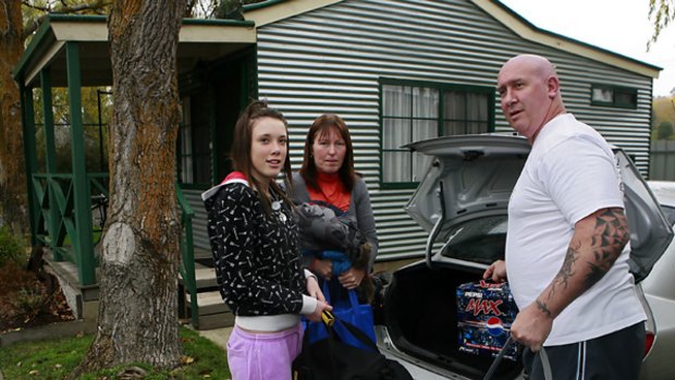 Maxine Rieger and her partner Allan White with their daughter Kimberley at Goldfields Holiday Park, Ballarat, are reluctant to give up road trips, despite fuel costs.
