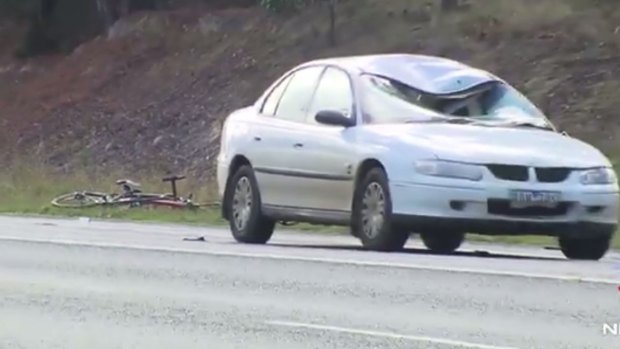 The white Holden involved in a crash with three cyclists in Macedon.