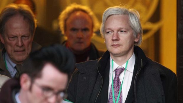 Silent &#8230; Assange refused to speak on leaving court in London.