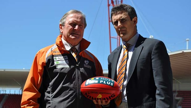 Sherrin some advice ... Kevin Sheedy and Leon Cameron chat after yesterday's announcement that the pair will team up at GWS next season.