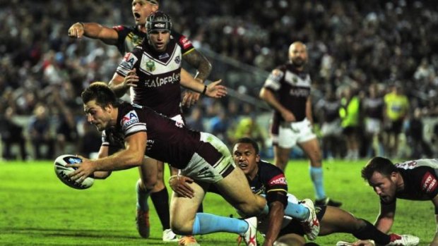 Confusion reigns: Kieran Foran's controversial try against North Queensland.
