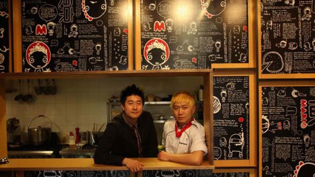 Fusion food ... manager Min Chung and head chef Duke Kim at Mario Tokyo, a Japanese-influenced pizza and pasta restaurant in Strathfield.
