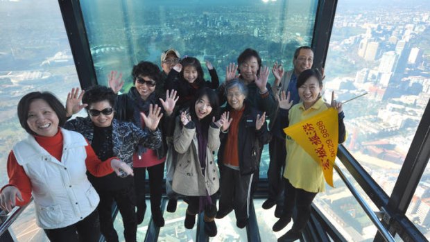 Chinese tourists at the top of the Eureka building.
