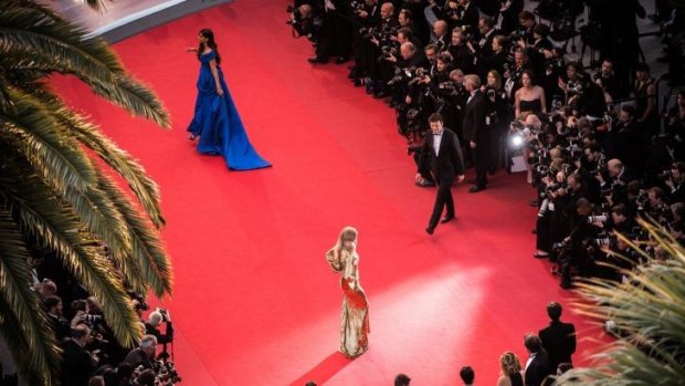In the red: Sonam Kapoor and Natasha Poly attend the Cannes premiere The <i>Sea Of Trees</i>.