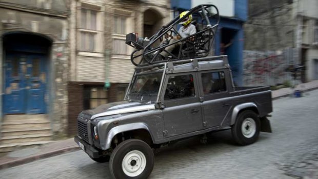 Ben Collins driving during filming of the latest James Bond film.