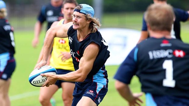 In demand &#8230; Japanese rugby target Berrick Barnes at Waratahs training on Thursday.