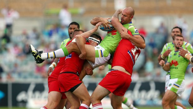 Hard times: the Dragons shrugged off their off-field woes to beat Canberra on Saturday.