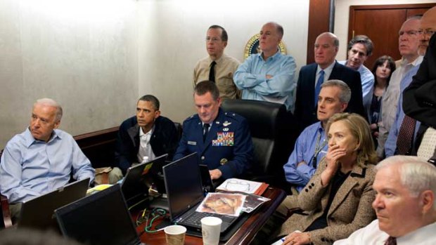 Hillary Clinton receives an update on the mission against Osama bin Laden at the White House.