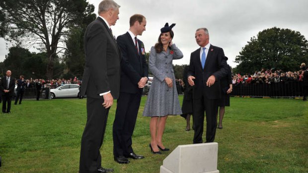 Australian War Memorial Director Brendan Nelson (R) speaks with Catherine, Duchess of Cambridge and Prince William, Duke of Cambridge and Australian War Memorial Chairman Ken Doolan (L) looks on after planting an Aleppo Pine seedling derived from seeds gathered after the battle of Lone Pine at Gallipoli.