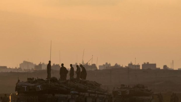 Tank-top watch: Israeli forces operating the length of the Gaza Strip have advanced up to three kilometres into the territory.