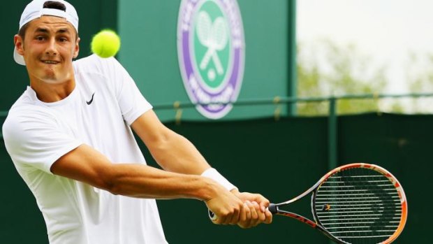 Bernard Tomic in action at Wimbledon last month.