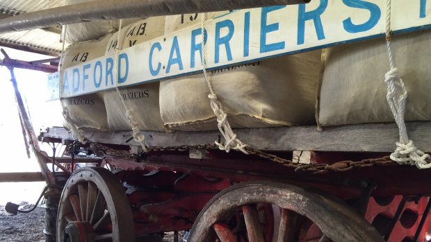 A sight of days gone by. This wool carriage is still pulled by five draft horses. Bradford Carriers have been around since the 1850s.