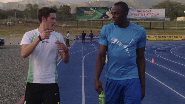 Making an impression: Jarrod Geddes and Usain Bolt training in Jamaica.