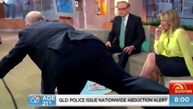 Bent double: Samantha Armytage chuckles as David Koch attempts the one-legged Romanian deadlift.