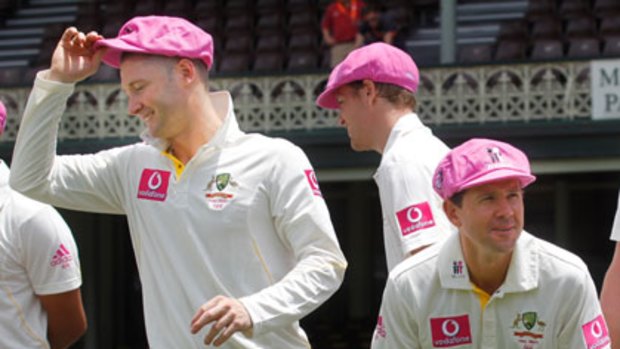 Pretty in pink ... stand-in Australian captain Michael Clarke and injured Ricky Ponting after the team's final training session in a McGrath foundation promotional photo shoot.