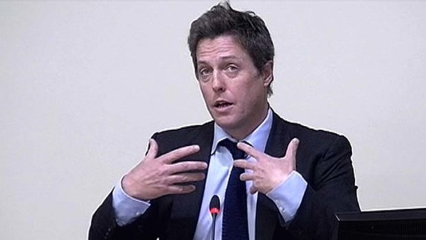 A still image from broadcast footage of actor Hugh Grant giving testimony at the Leveson inquiry into press standards at the High Court in London.