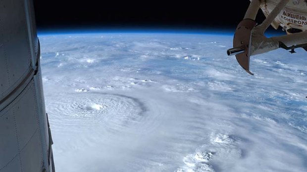 Growing swell ... a picture of typhoon Bopha as it bore down on the Philippines taken by Commander Kevin Ford on the International Space Station.