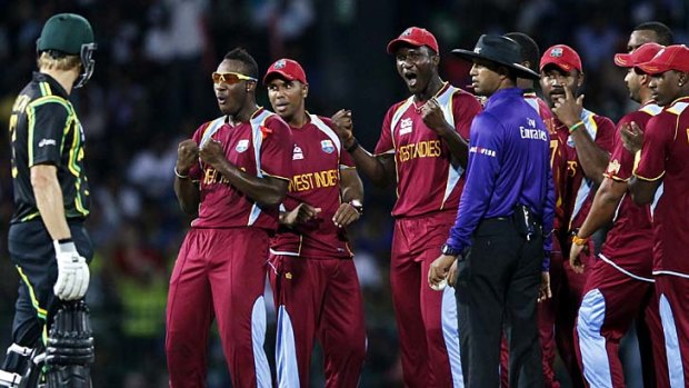 Ganging up &#8230; Shane Watson watches the West Indians react to a dismissal.