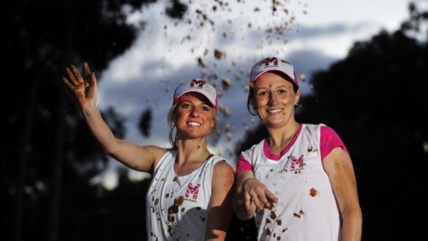 From left, Rochelle Riley of Casey and Sharon Moloney of O'Connor preparing for Miss Muddy, an obstacle course fitness event that will be held at Exhibition Park in Canberra on October 19.