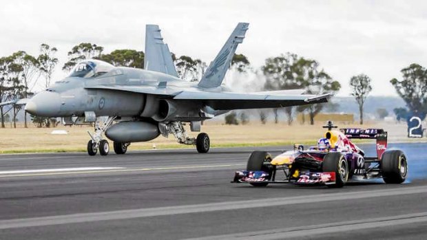 Mismatch: Red Bull's Daniel Ricciardo has compared his incredible day job to that of a Royal Australian Air Force Pilot with a run around at a regional Air Force Base.