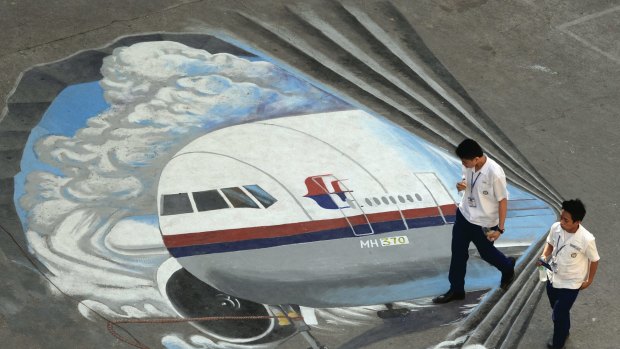 A mural for the missing MH 370 plane at a school in Makati, Malaysia. 