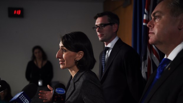 The Premier Gladys Berejiklian will have responsibility for a list of UrbanGrowth projects. The Minister for Planning and Housing Anthony Roberts (right) has responsibility for Landcom.