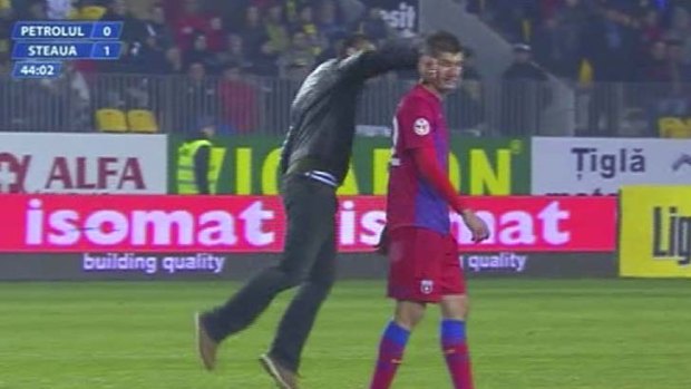 Attacked on the pitch ... Steaua Bucharest defender George Galamaz.