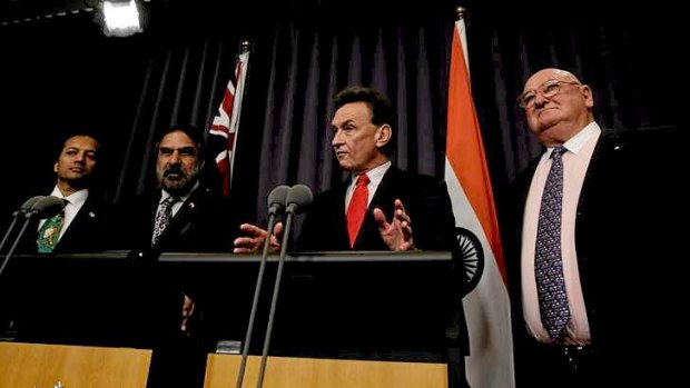 Naveen Jindal, managing director of Jindal Steel & Power, with India?s Commerce and Industry Minister Anand Sharma, Australia's Trade Minister Craig Emerson and businessman Lindsay Fox at a media conference in Canberra in 2011.