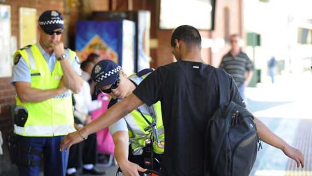 Police conduct weapons searches at Footscray station last November.
