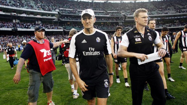 Collingwood's now former fitness coach David Buttifant with Nathan Buckley.
