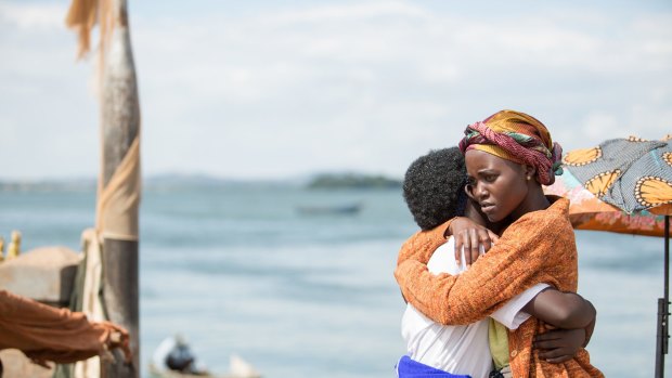 Oscar winner Lupita Nyong'o and newcomer Madina Nalwanga in Disney's <i>Queen of Katwe</i>, the true story of a girl from the slums of Uganda whose world changes when she is introduced to chess. 