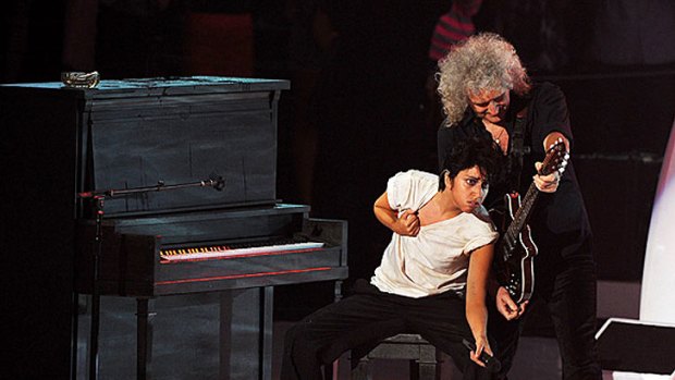 Lady Gaga performs with Brian May during the 2011 MTV Video Music Awards.