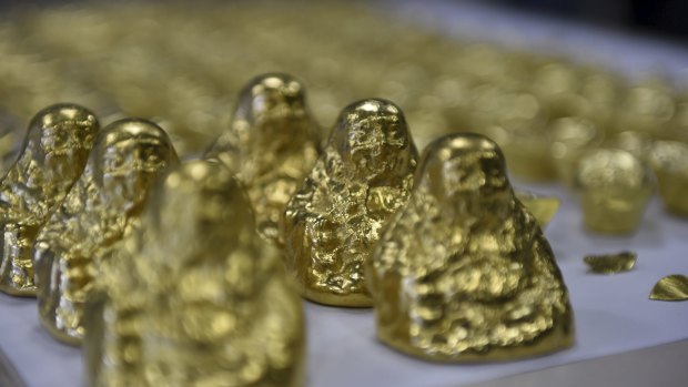 Some of the fake gold Buddhas Ming Zhu was allegedly selling. 