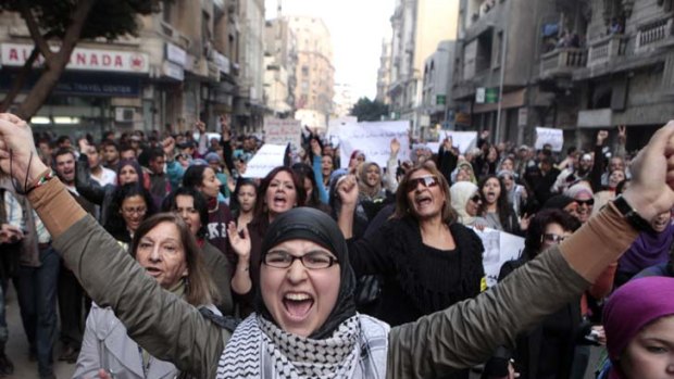 In unison &#8230; Egyptian women march through the streets of Cairo to object to the army's mistreatment of female protesters.
