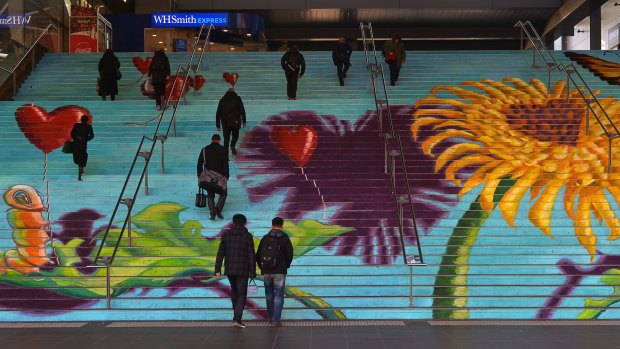 Artwork by Zest at Southern Cross station aims at 'nudging' people to take the stairs.