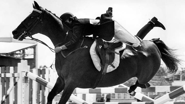 Going ... Judith Higley, as she was then, taking a tumble at the Royal Easter Show in 1967 after her horse clipped the rails.
