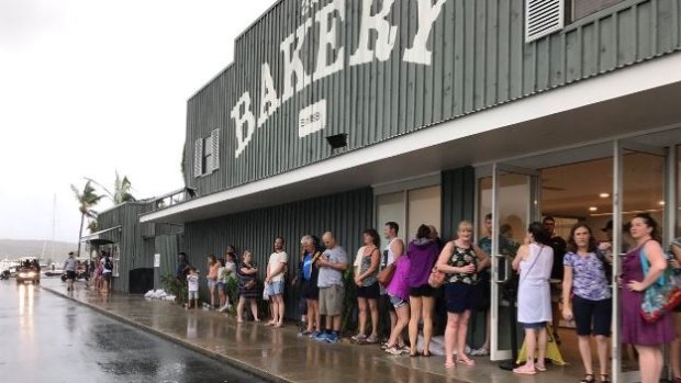 The queue outside the bakery on Hamilton Island after Cyclone Debbie.
