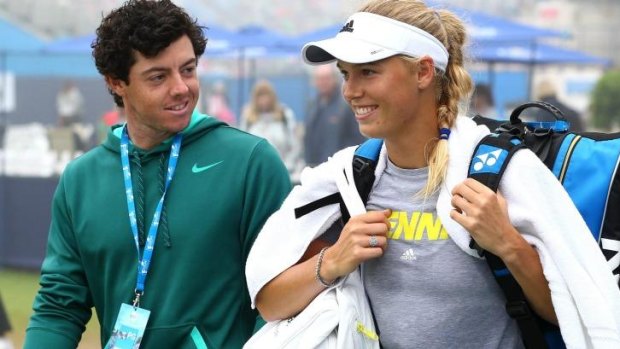 The way they were: Rory McIlroy and Caroline Wozniacki in England last year.