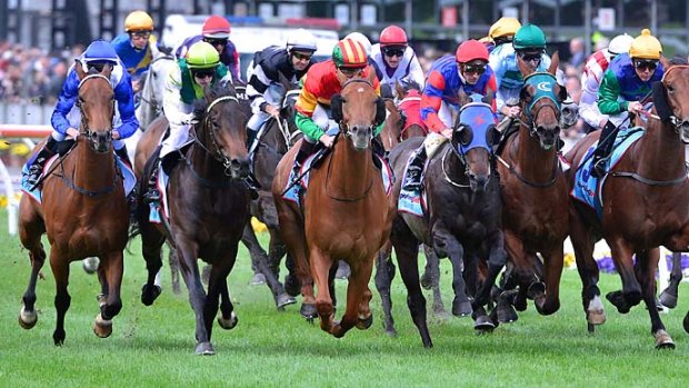The Cox Plate field bunches up past the post the first time around.