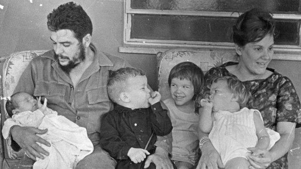 The couple with their children in March 1965 at their house in Havana before Che left for the Congo.