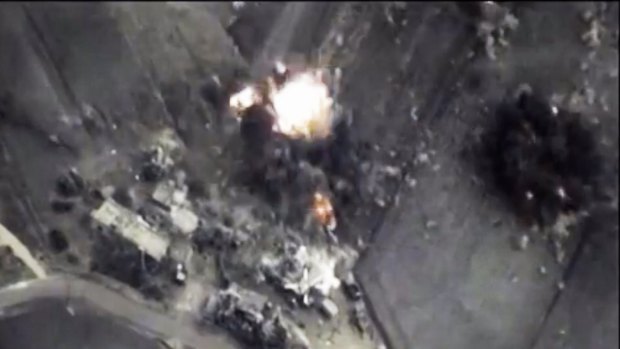 This image from the Russian Defence Ministry shows a Russian Air Force bomb hitting a target in Syria. A spokesman for Russian President Vladimir Putin admitted on Thursday Russia's air strikes are targeting not only Islamic State militants but also other groups.