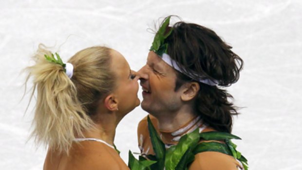 Russia's Oksana Domnina and Maxim Shabalin rub noses at the end of their performance in the ice dance original dance figure skating event.