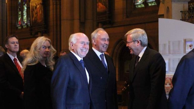 Old prime ministers and a former spouse ... John Howard shares a laugh with two electoral foes, Paul Keating and Kevin Rudd, as Annita Keating van Iersel looks on.