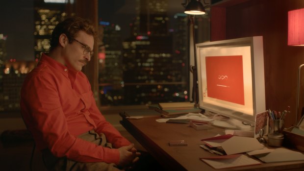 Joaquin Phoenix falls for his operating system Samantha in<i> Her</i>.