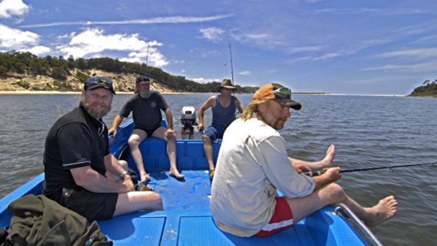 Steve Phelan, Jim McGuire, Glen Spalding and Reece Warren take time out for a spot of relaxation and fishing in Sydenham Inlet in Far East Gippsland.
