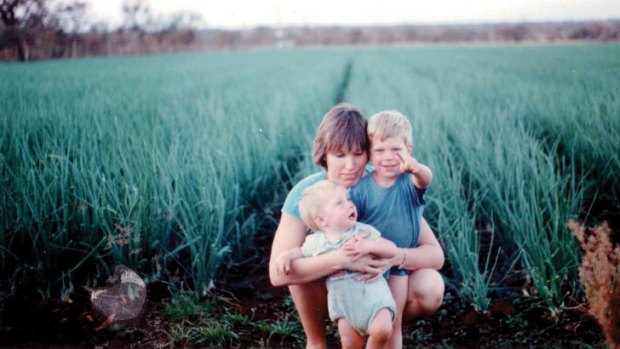 Field of dreams past … with his mother, Jane, and younger brother, Michael, on their farm in Zimbabwe in 1990.