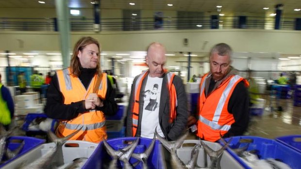 It's what you do with it ... from left, leading chefs Magnus Nilsson, Mark Best, and Alex Atala at the Sydney Fish Market yesterday.