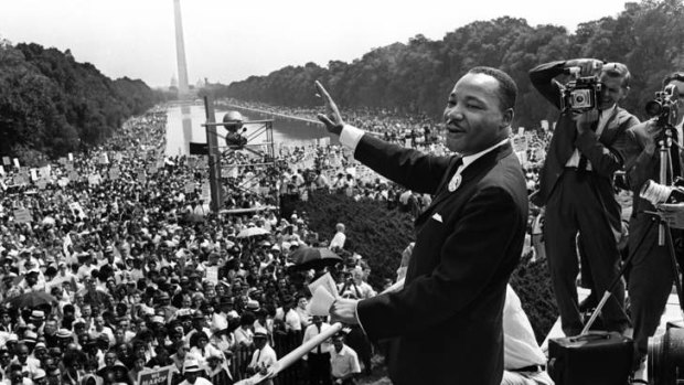 The civil rights leader Martin Luther KIng waves to supporters on the Mall in Washington, DC during the "March on Washington" in 1963.