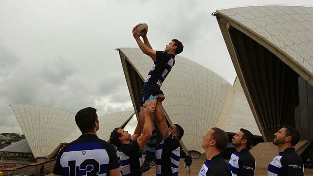 On the up ... Lachlan McGregor, lifted, with his teammates from the Sydney Convicts at the Opera House. Their bid for Sydney to host the 2014 Bingham Cup was backed by the Prime Minister, Julia Gillard.